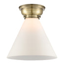 Cone Flush Mount shown in the Antique Brass finish with a Matte White shade