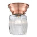 Colton Flush Mount shown in the Antique Copper finish with a Clear Halophane shade