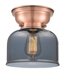 Bell Flush Mount shown in the Antique Copper finish with a Plated Smoke shade