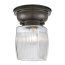 Colton Flush Mount shown in the Oil Rubbed Bronze finish with a Clear Halophane shade