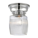 Colton Flush Mount shown in the Polished Chrome finish with a Clear Halophane shade