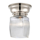 Colton Flush Mount shown in the Polished Nickel finish with a Clear Halophane shade