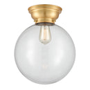 Beacon Flush Mount shown in the Satin Gold finish with a Clear shade