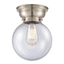 Beacon Flush Mount shown in the Brushed Satin Nickel finish with a Seedy shade