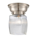 Colton Flush Mount shown in the Brushed Satin Nickel finish with a Clear Halophane shade