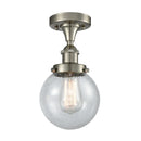 Beacon Flush Mount shown in the Brushed Satin Nickel finish with a Seedy shade