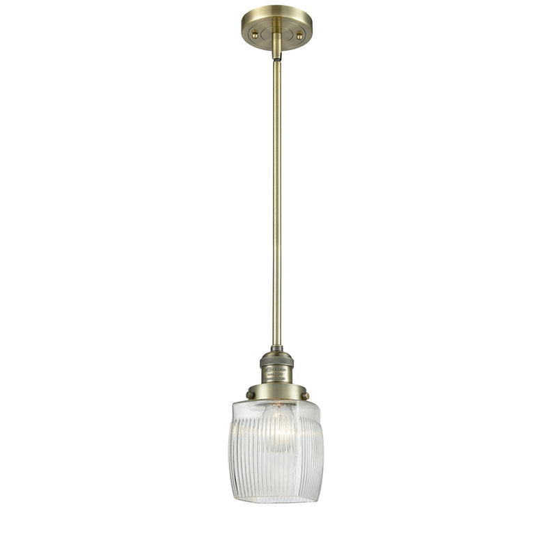 Colton Mini Pendant shown in the Antique Brass finish with a Clear Halophane shade