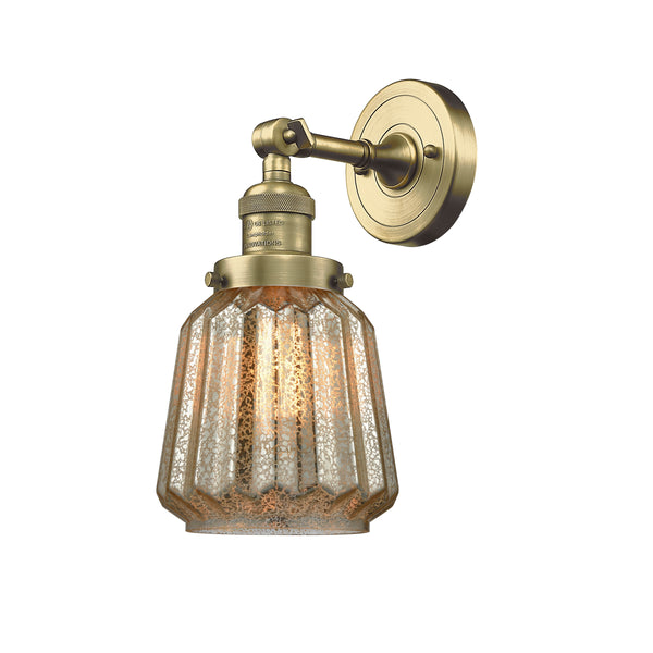 Chatham Sconce shown in the Antique Brass finish with a Clear shade