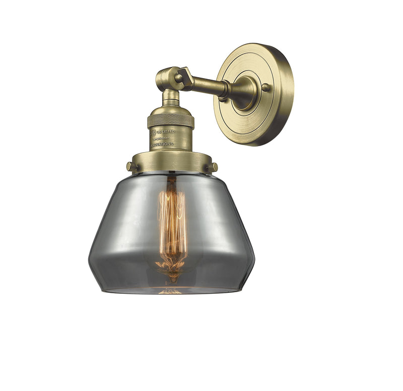 Innovations Lighting Fulton 1-100 watt 7 inch Antique Brass Sconce Smoked glass  180 Degree Swivel With Engraved Cast Cup 203ABG173