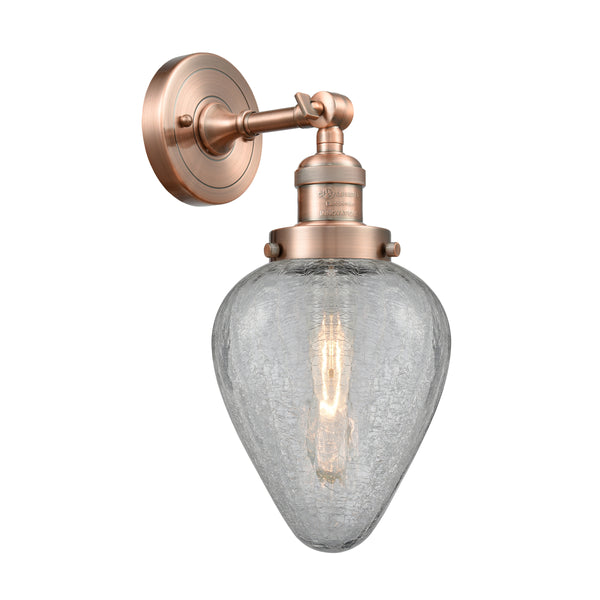 Geneseo Sconce shown in the Antique Copper finish with a Clear Crackled shade