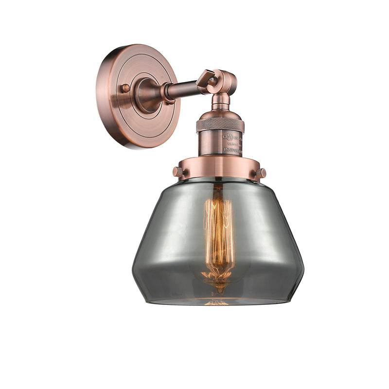 Fulton Sconce shown in the Antique Copper finish with a Plated Smoke shade