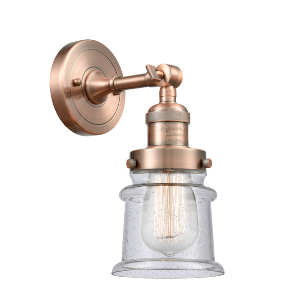 Canton Sconce shown in the Antique Copper finish with a Seedy shade