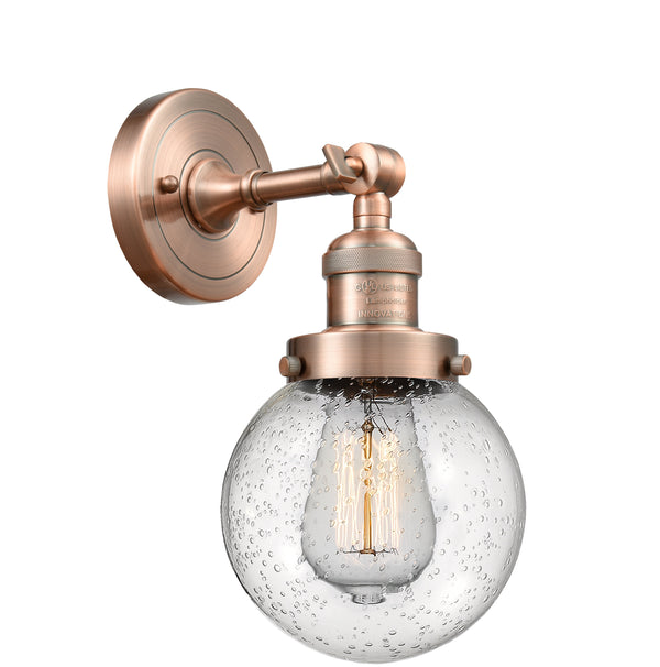 Innovations Lighting Beacon 1-100 watt 6 inch Antique Copper Sconce Seedy Glass  180 Degree Adjustable Swivel 203ACG2046