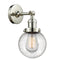 Beacon Sconce shown in the Polished Nickel finish with a Seedy shade