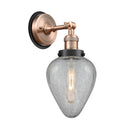 Geneseo Sconce shown in the Antique Copper finish with a Clear Crackled shade