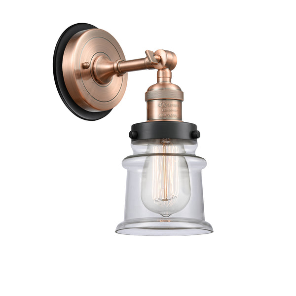 Canton Sconce shown in the Antique Copper finish with a Clear shade