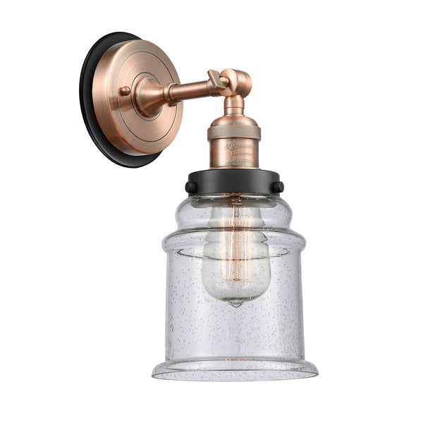 Canton Sconce shown in the Antique Copper finish with a Seedy shade