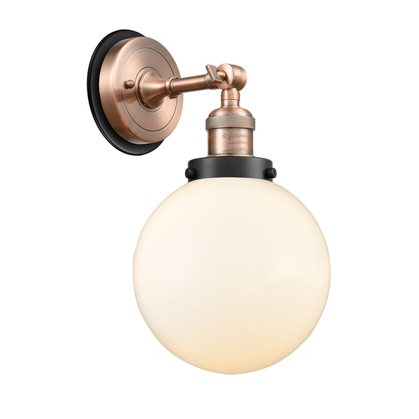 Beacon Sconce shown in the Antique Copper finish with a Matte White shade