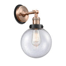 Beacon Sconce shown in the Antique Copper finish with a Seedy shade