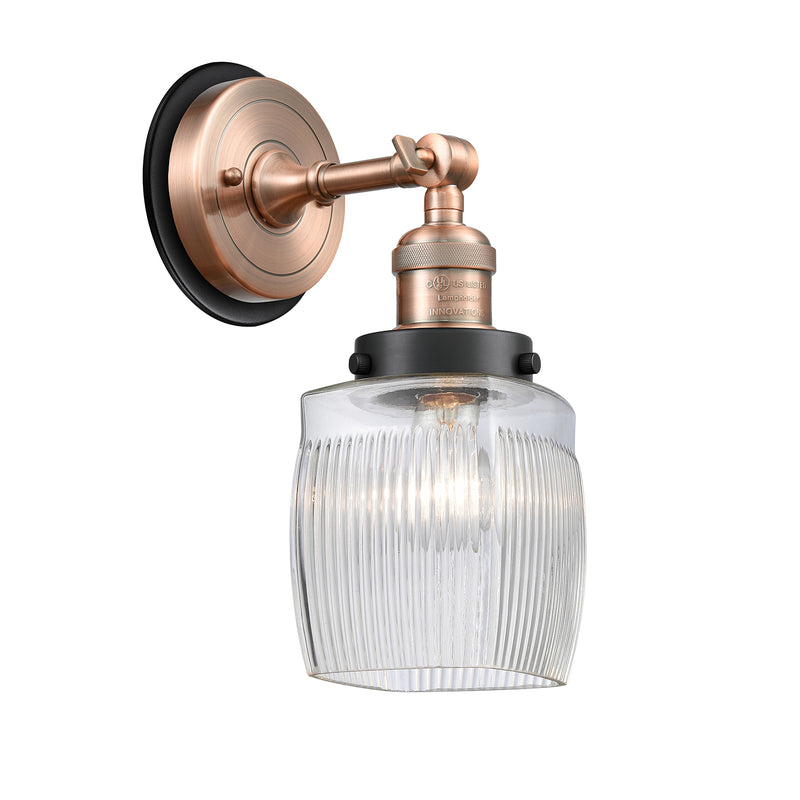 Colton Sconce shown in the Antique Copper finish with a Clear Halophane shade