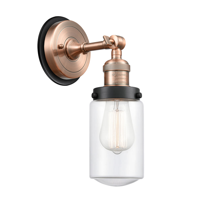 Dover Sconce shown in the Antique Copper finish with a Clear shade