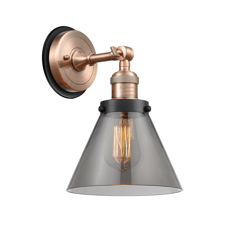 Cone Sconce shown in the Antique Copper finish with a Plated Smoke shade