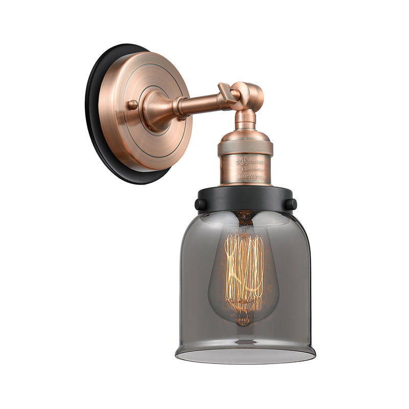 Bell Sconce shown in the Antique Copper finish with a Plated Smoke shade