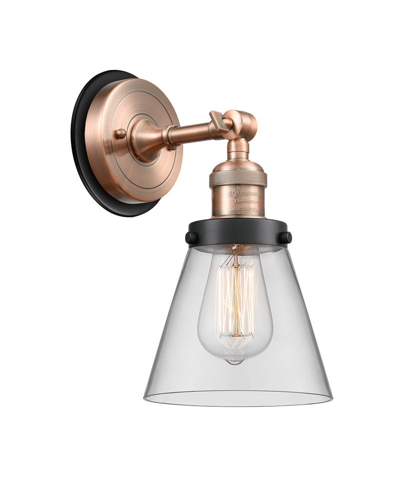 Cone Sconce shown in the Antique Copper finish with a Clear shade