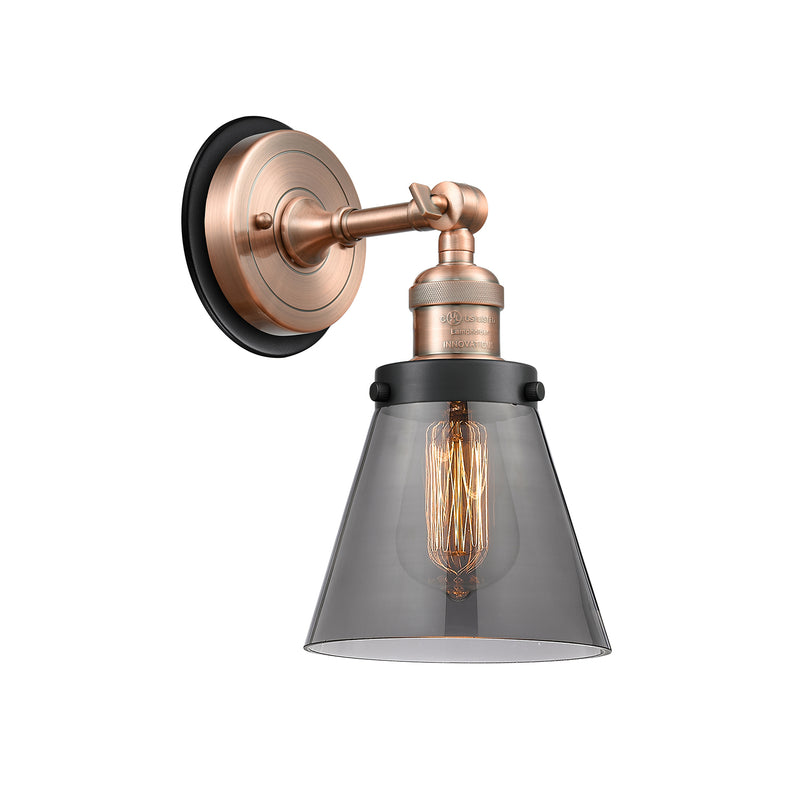 Cone Sconce shown in the Antique Copper finish with a Plated Smoke shade