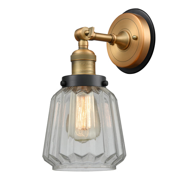 Chatham Sconce shown in the Brushed Brass finish with a Clear shade
