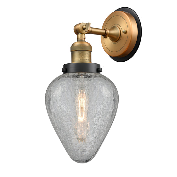 Geneseo Sconce shown in the Brushed Brass finish with a Clear Crackled shade