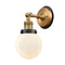 Beacon Sconce shown in the Brushed Brass finish with a Matte White shade