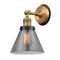 Cone Sconce shown in the Brushed Brass finish with a Plated Smoke shade