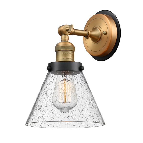 Cone Sconce shown in the Brushed Brass finish with a Seedy shade