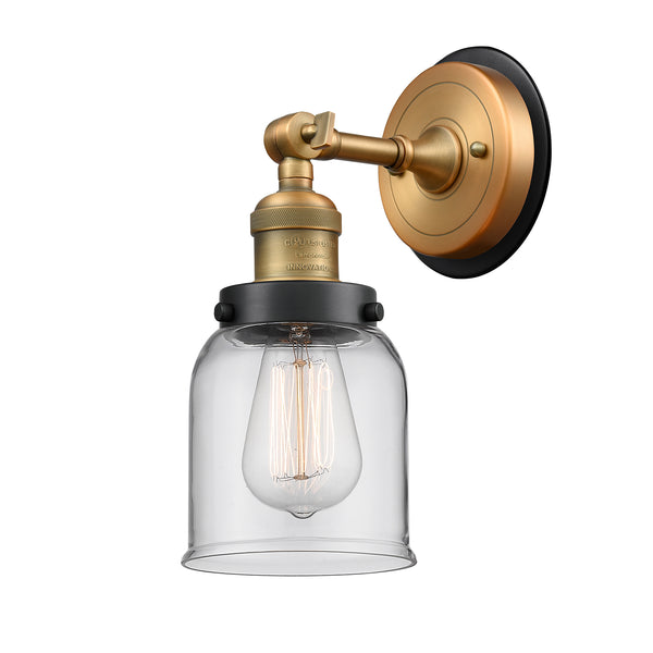 Bell Sconce shown in the Brushed Brass finish with a Clear shade