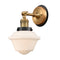 Oxford Sconce shown in the Brushed Brass finish with a Matte White shade