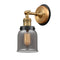 Bell Sconce shown in the Brushed Brass finish with a Plated Smoke shade