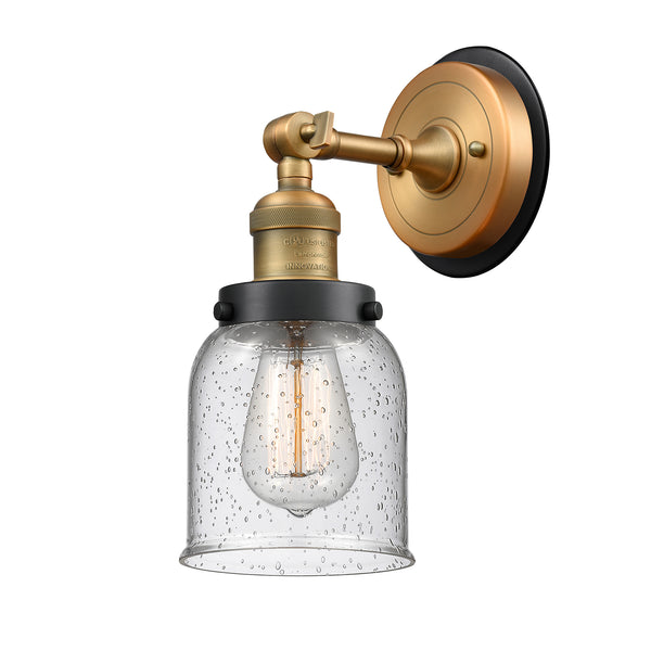 Bell Sconce shown in the Brushed Brass finish with a Seedy shade