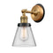 Cone Sconce shown in the Brushed Brass finish with a Clear shade