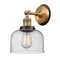 Bell Sconce shown in the Brushed Brass finish with a Seedy shade