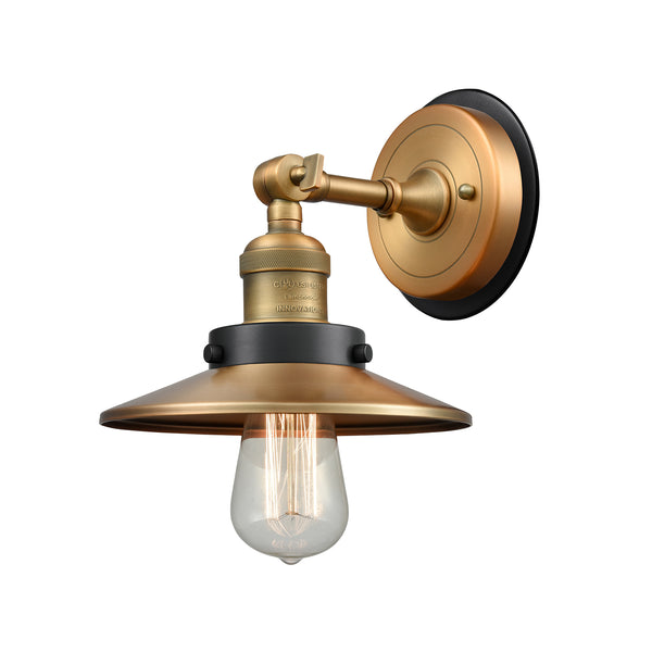 Railroad Sconce shown in the Brushed Brass finish with a Antique Copper shade
