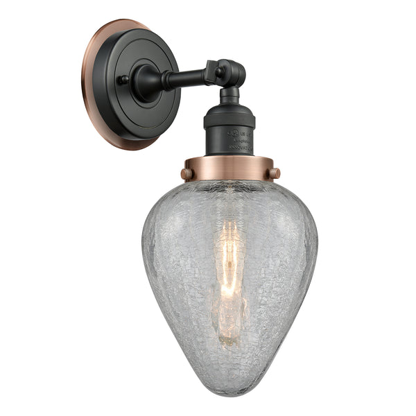 Geneseo Sconce shown in the Matte Black finish with a Clear Crackled shade