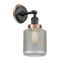 Stanton Sconce shown in the Matte Black finish with a Clear Wire Mesh shade
