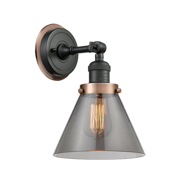 Cone Sconce shown in the Matte Black finish with a Plated Smoke shade
