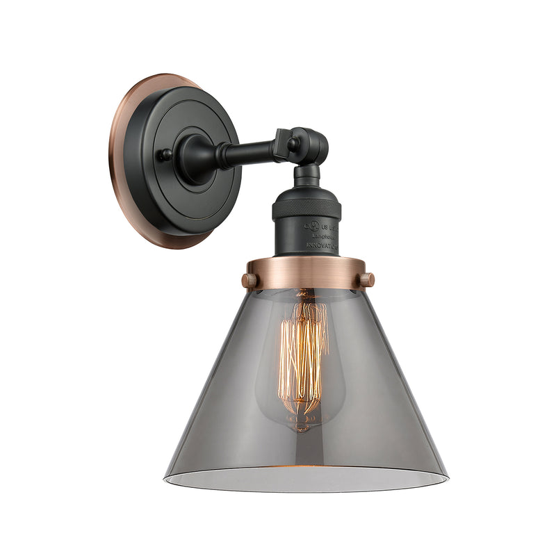 Cone Sconce shown in the Matte Black finish with a Plated Smoke shade