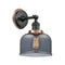 Bell Sconce shown in the Matte Black finish with a Plated Smoke shade