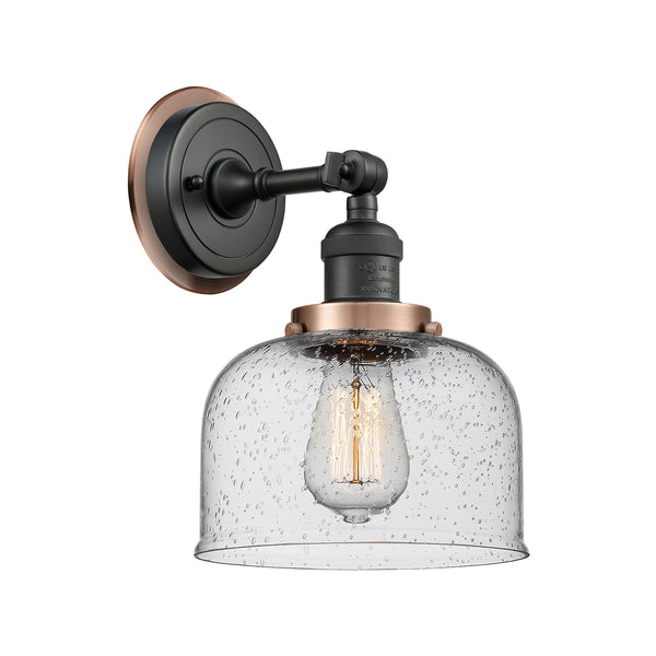 Bell Sconce shown in the Matte Black finish with a Seedy shade
