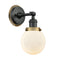 Beacon Sconce shown in the Matte Black finish with a Matte White shade