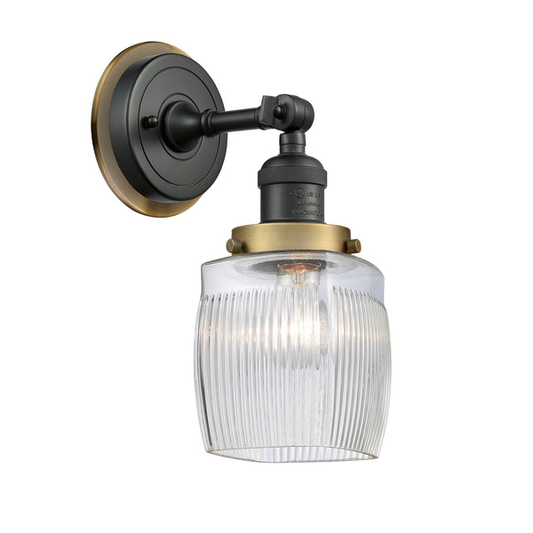 Colton Sconce shown in the Matte Black finish with a Clear Halophane shade
