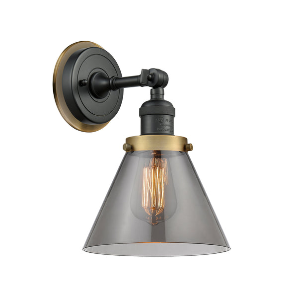 Cone Sconce shown in the Matte Black finish with a Plated Smoke shade